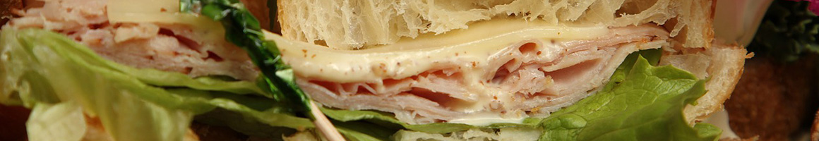 Eating Deli Sandwich at Car-Mira's Deli restaurant in Upper Chichester, PA.